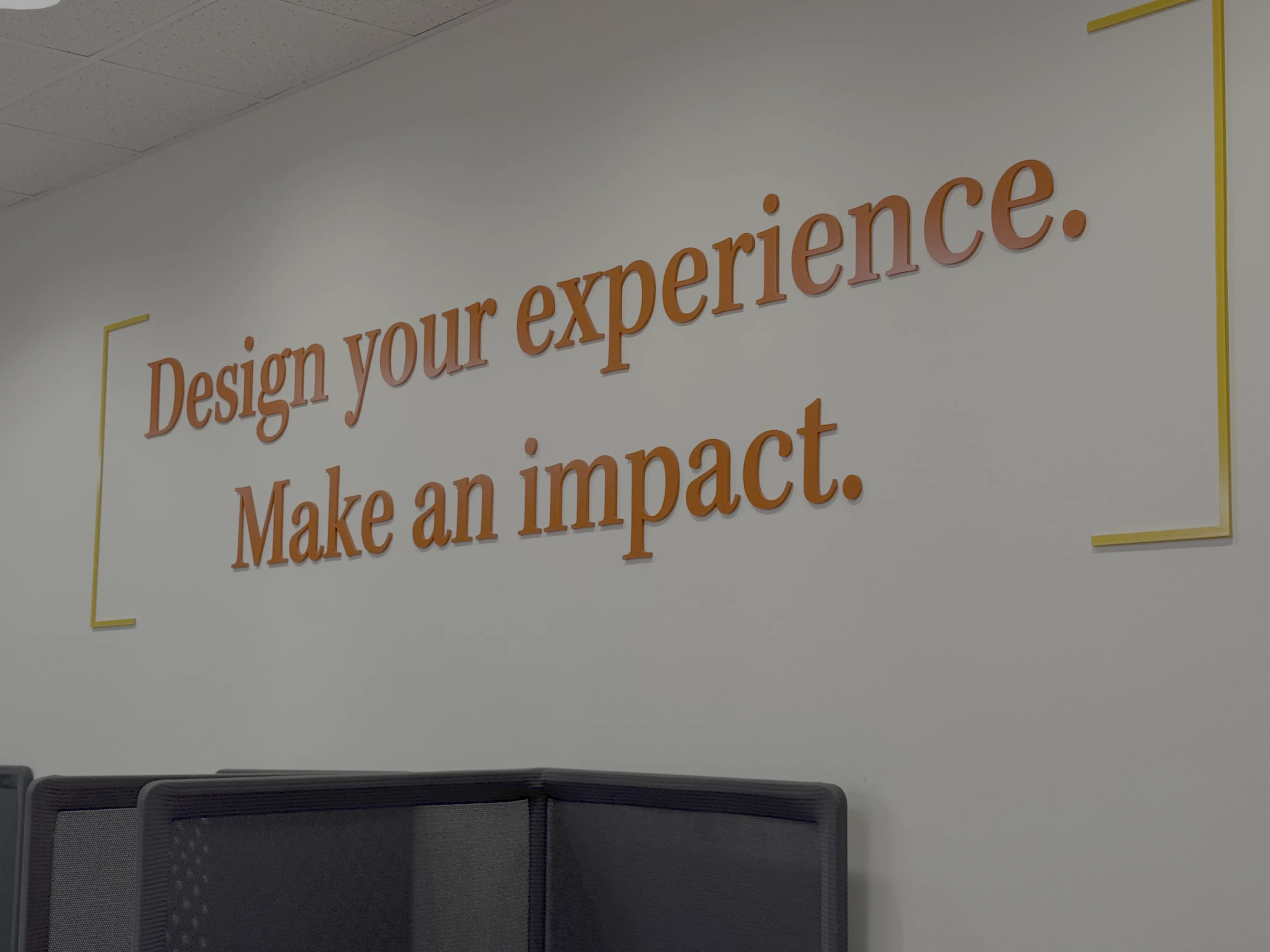 Design your experience. Make an Impact wall sign